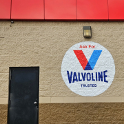 Painted Logo on Brick wall, Valvoline Logo.